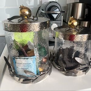 Two Michael Aram small and medium Pomegranate canisters